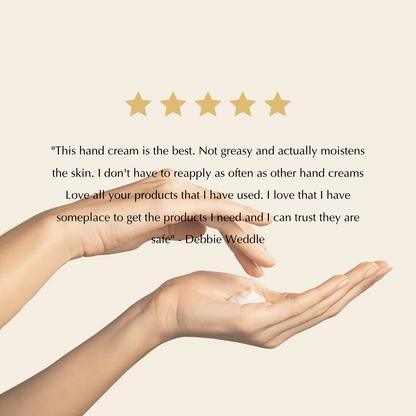 Hands applying white hand cream with five-star rating above