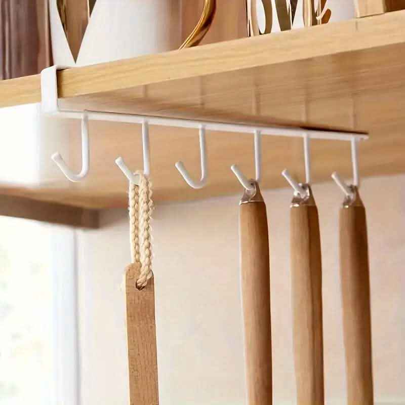 6-hook kitchen shelf storage rack with 6 white hooks on a light rail