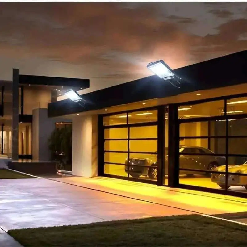 Solar motion sensor garden lights glowing along an outdoor walkway
