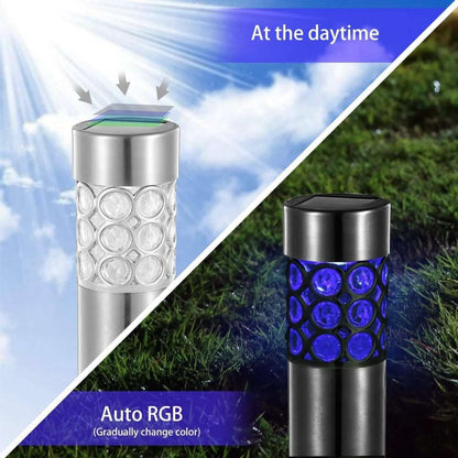 Outdoor solar garden light with blue RGB glow through clear circular lens