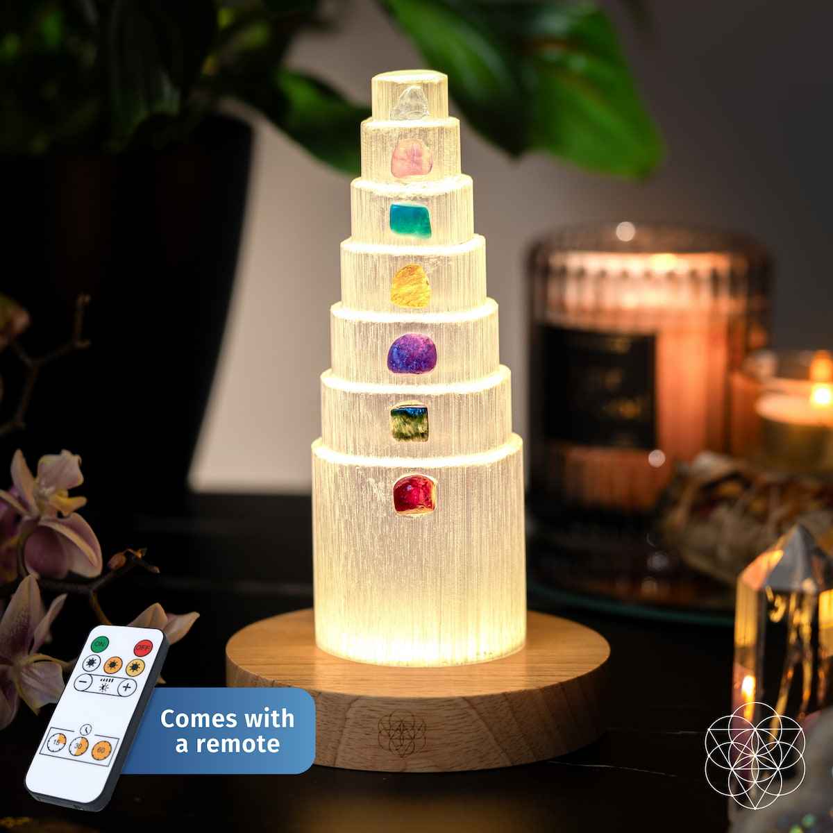 Glowing healing crystal lamp with stacked tiers and multicolor crystal insets on wood base