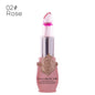 Flower lip gloss in rose-pink tube with translucent cone tip and magenta flower detail