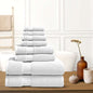 Silver bath towel stack with neatly folded terry towels, layered display