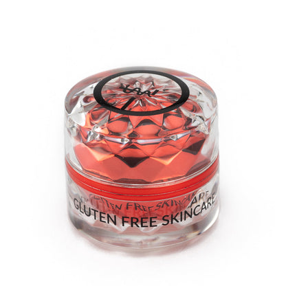 Gluten-free skincare eye cream jar with red gel-like contents
