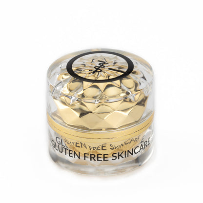 Eye cream jar with gold faceted lid and gluten-free skin care label
