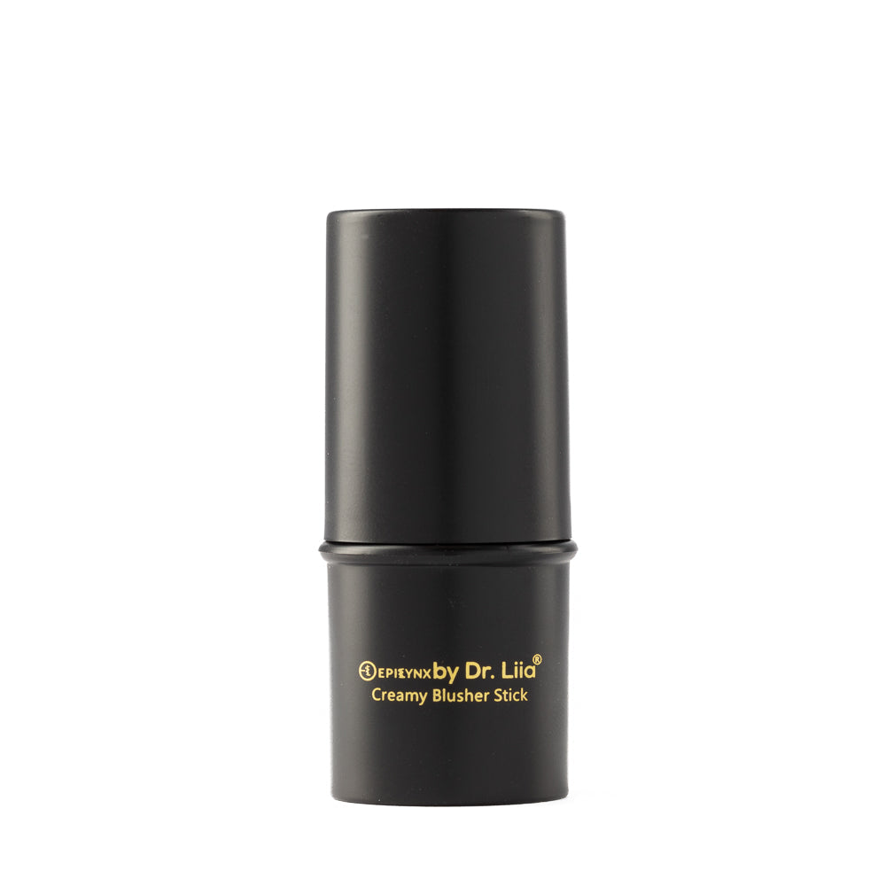 Compact creamy blush stick in black container with pink cap