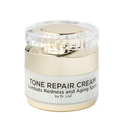 Cream jar with clear faceted lid and beige base, labeled Tone Repair Cream