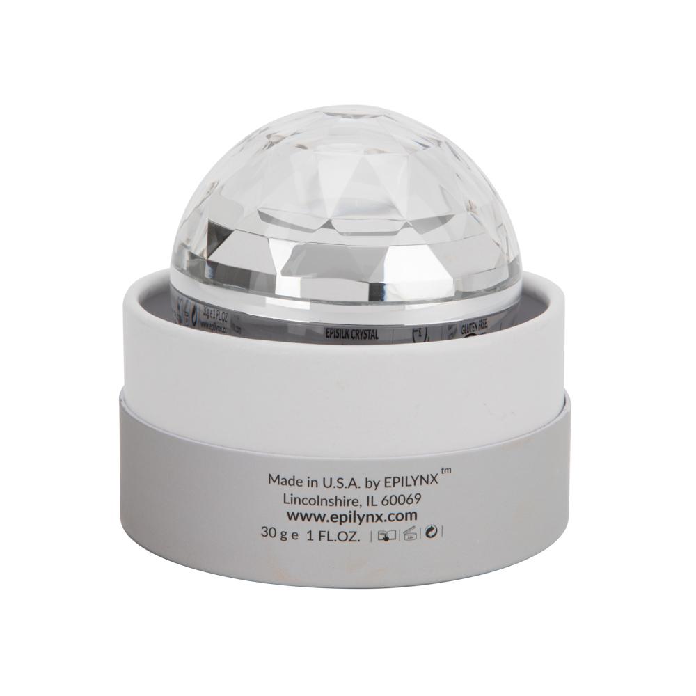 Face cream jar with white cap and faceted clear dome lid