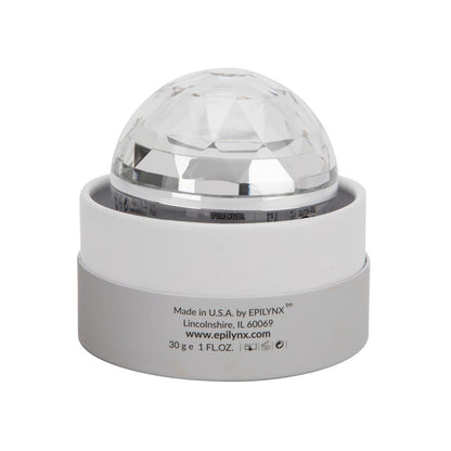 Face cream jar with white cap and faceted clear dome lid