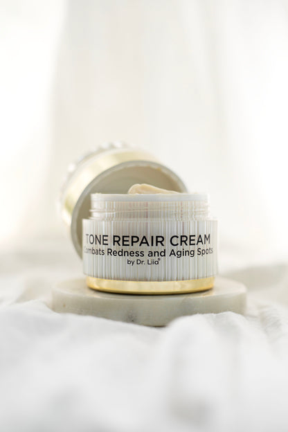 Tone Repair Cream jar with lid flipped open, showing inner rim