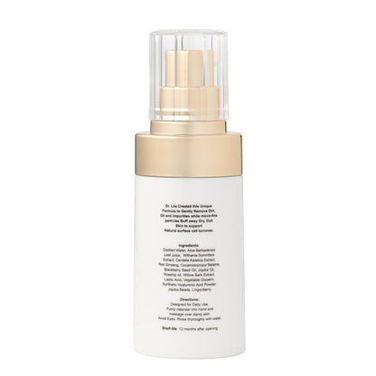 Skincare face scrub cleanser bottle with clear pump top and gold band