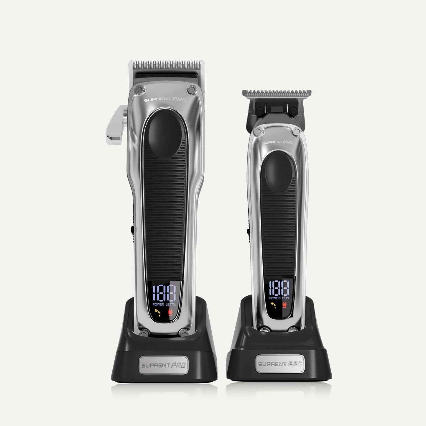 Professional hair clipper set: two silver clippers with black grips and LED display on bases