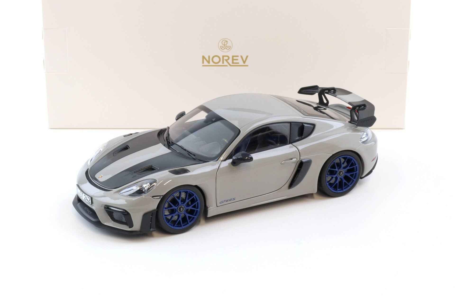 Norev 2023 Porsche 718 Cayman GT4 RS w/ Weissach Package Chalk w/ Blue Wheels 1:18