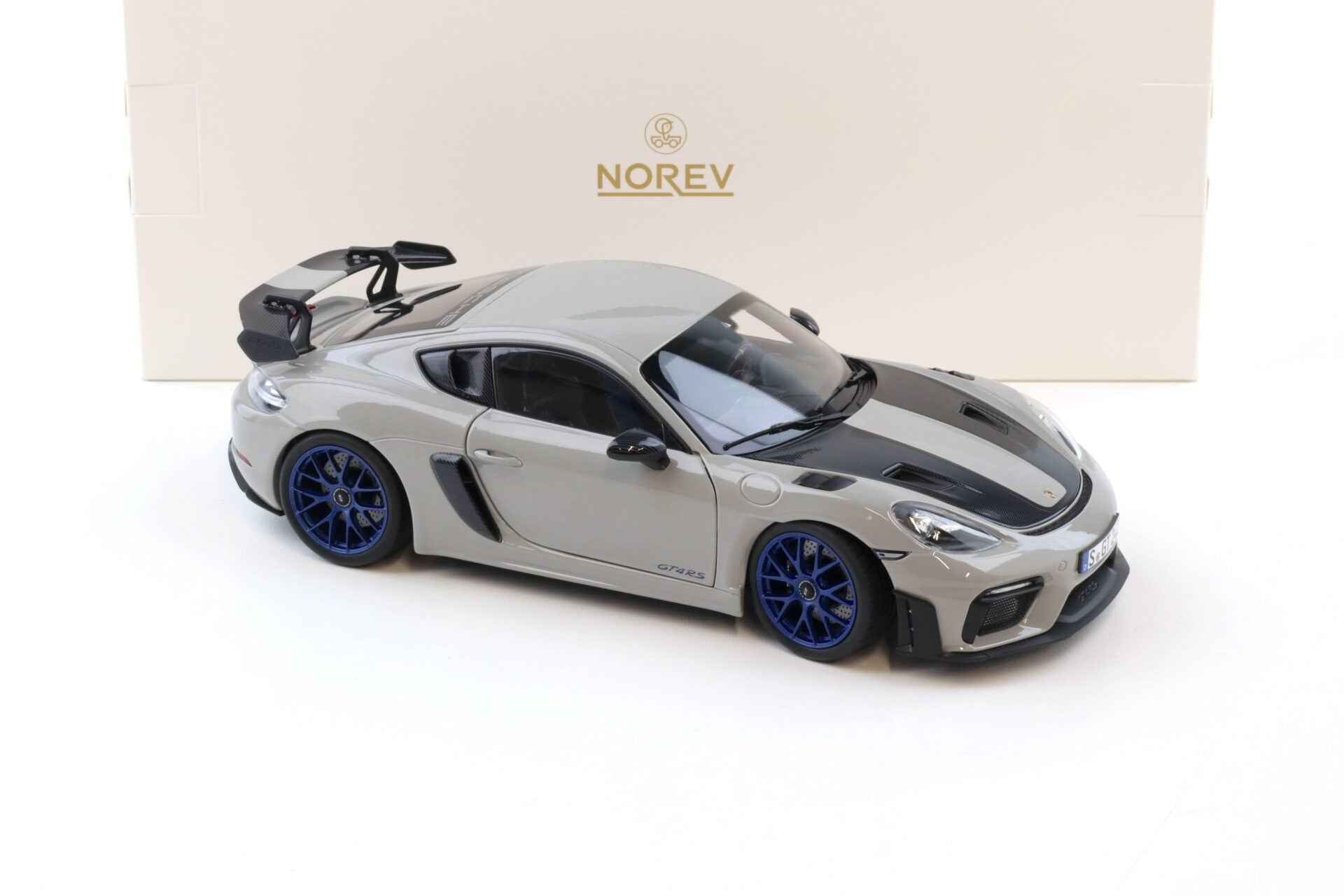 Norev 2023 Porsche 718 Cayman GT4 RS w/ Weissach Package Chalk w/ Blue Wheels 1:18