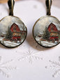 Round farm-scene holiday earrings with red barn and snowy landscape, gold-tone hooks