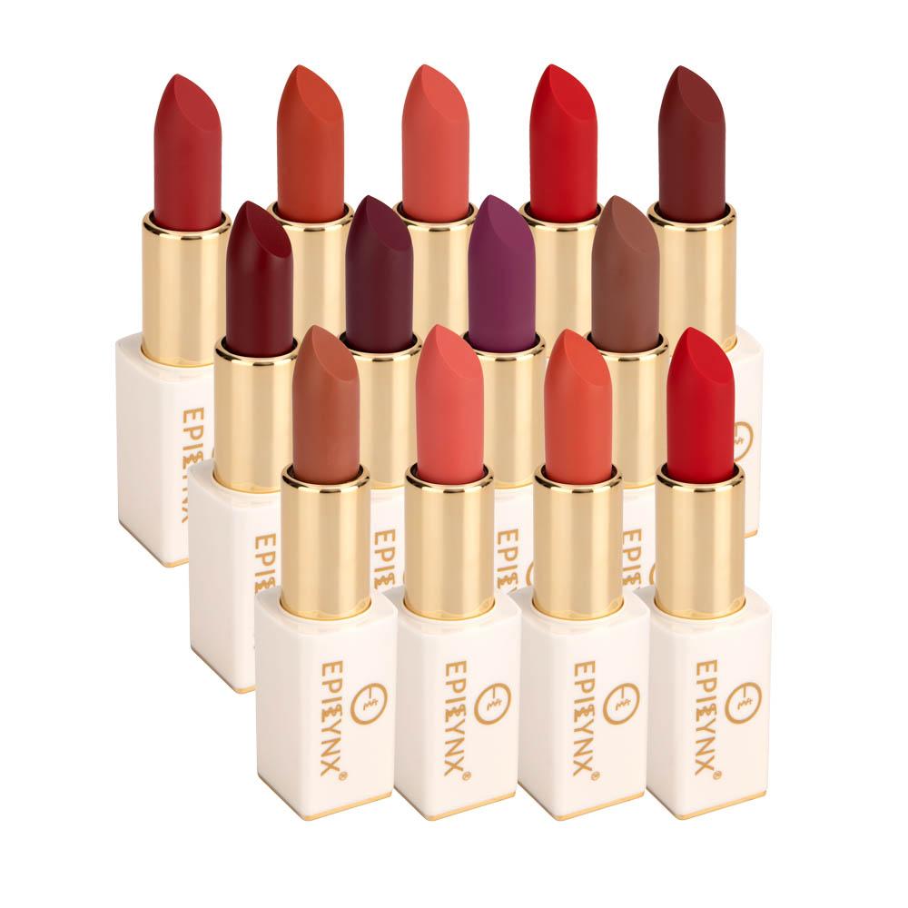 Matte lipstick tubes set with gold caps, showing multiple red and plum shades