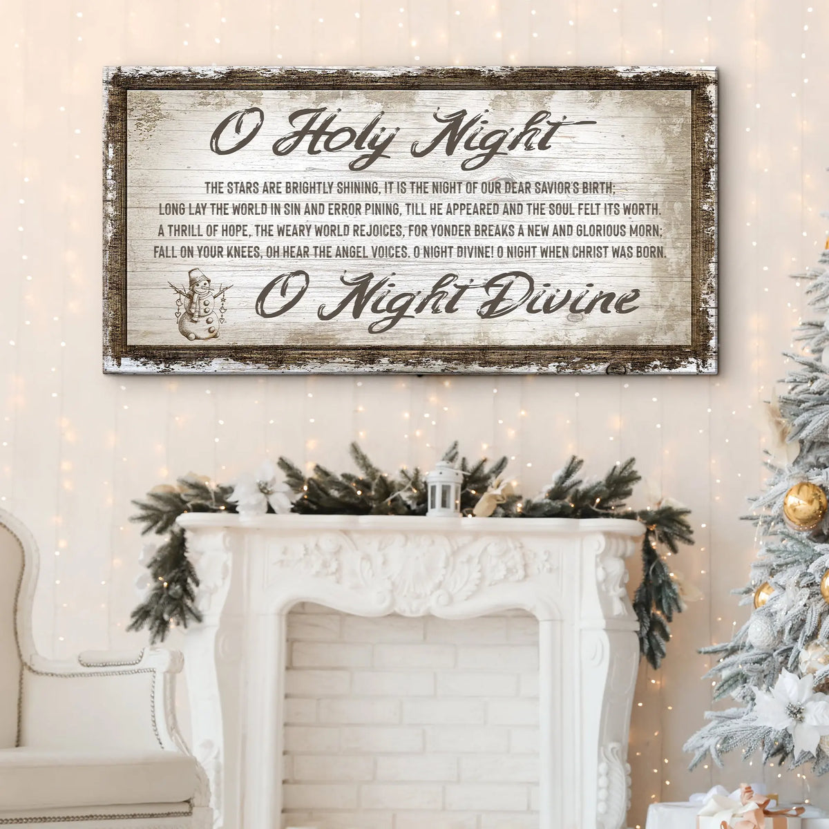 Framed “O Holy Night” wall sign above a white fireplace mantel