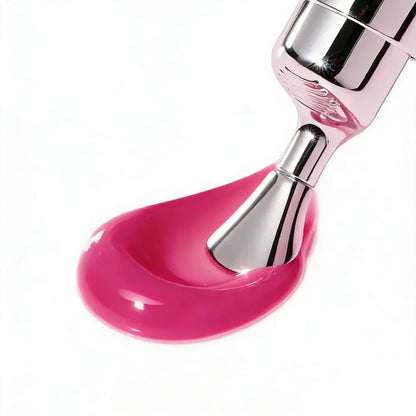 Magenta pink glossy lip treatment flow on applicator tip, with metallic dispenser.