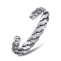 Silver magnetic therapy bracelet bangle with twisted links and circular magnetic insets