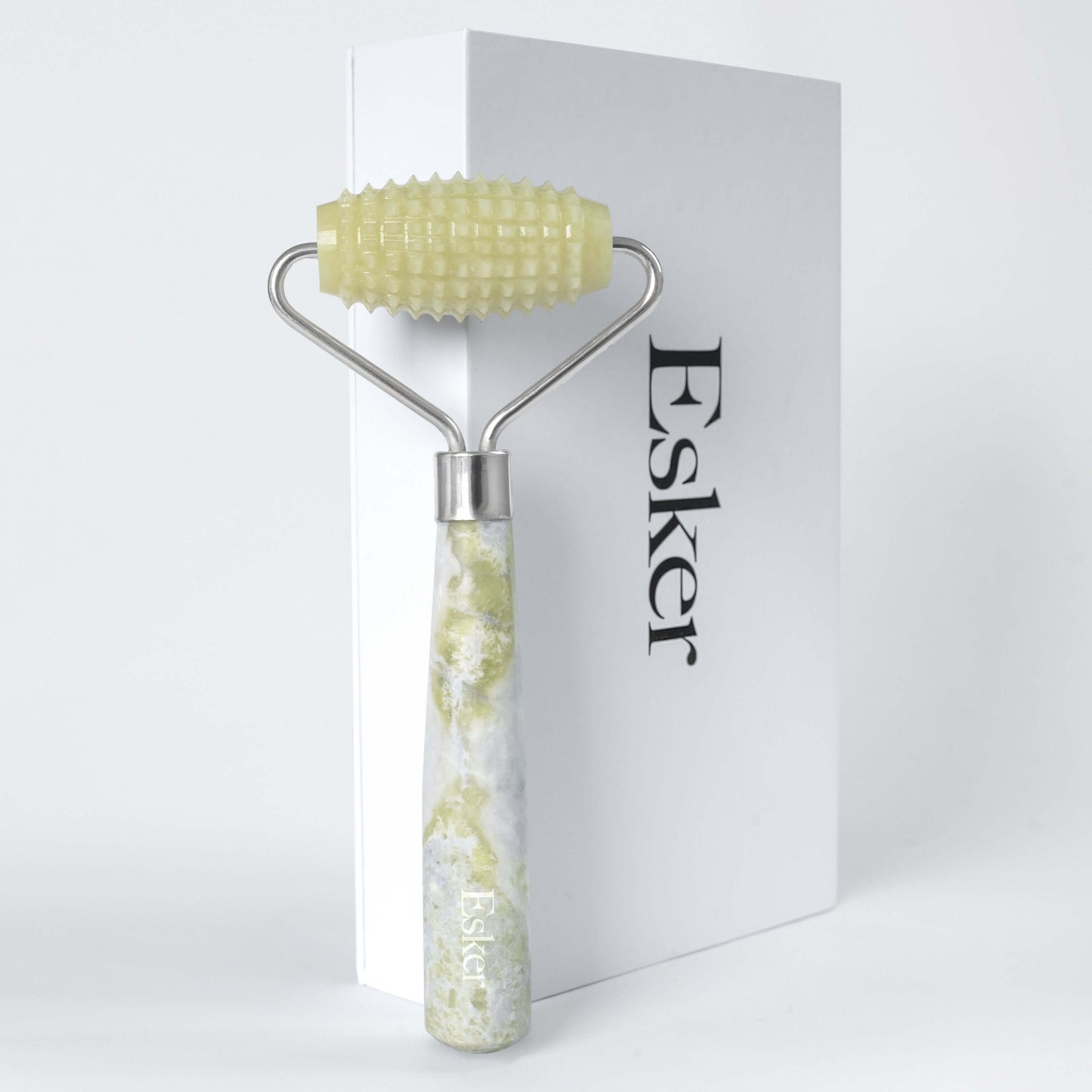 Allover roller with textured light-green head and speckled jade-look handle