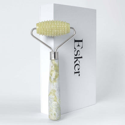Allover roller with textured light-green head and speckled jade-look handle