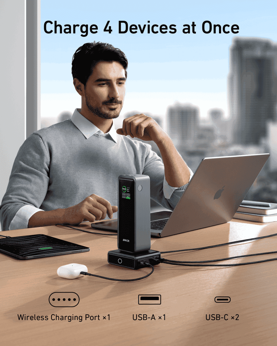 Anker 100W charging base on desk, compact black dock with front LED and USB-C ports