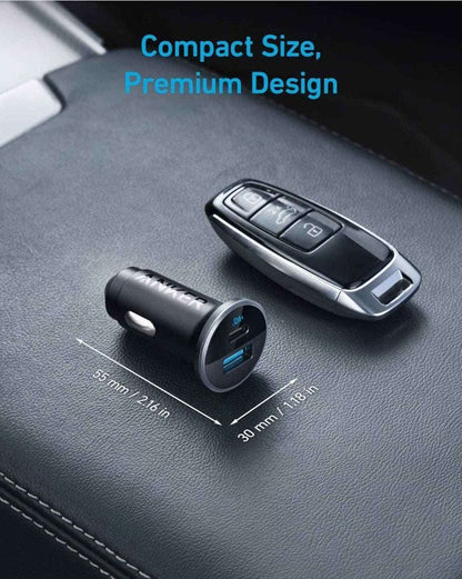 Compact Anker car charger with blue-lit USB port, shown with size measurements