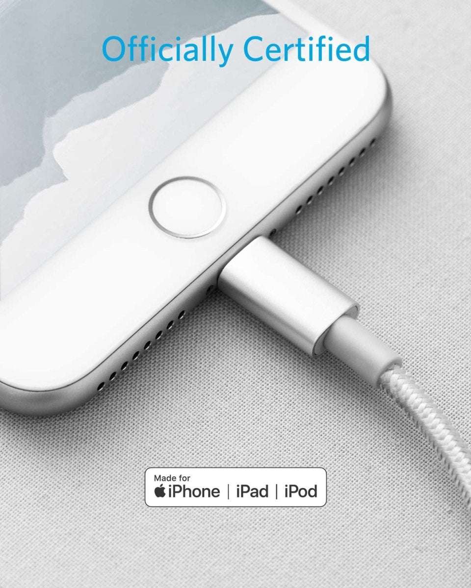 USB-C to Lightning cable with Lightning plug and small loop on a light fabric surface