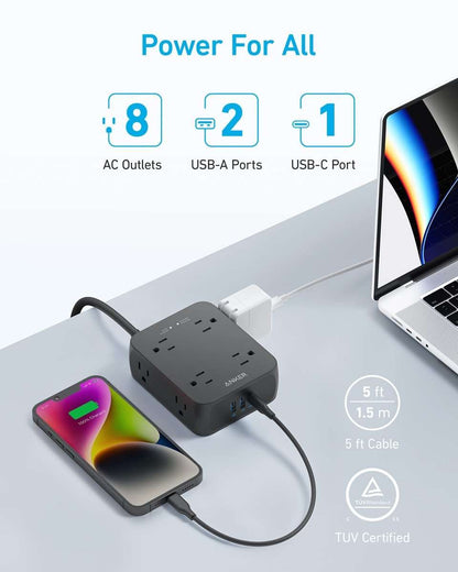 Black USB power strip with multiple AC outlets and built-in USB ports, compact cube
