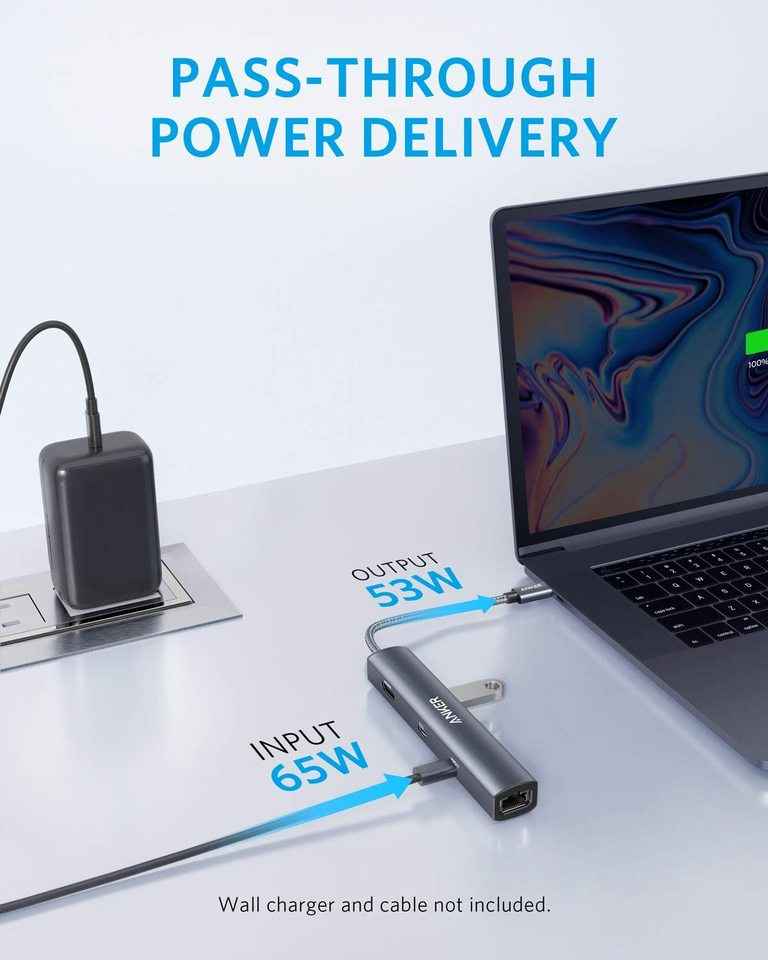 Grey USB-C hub connected to a laptop with a front USB-C output port