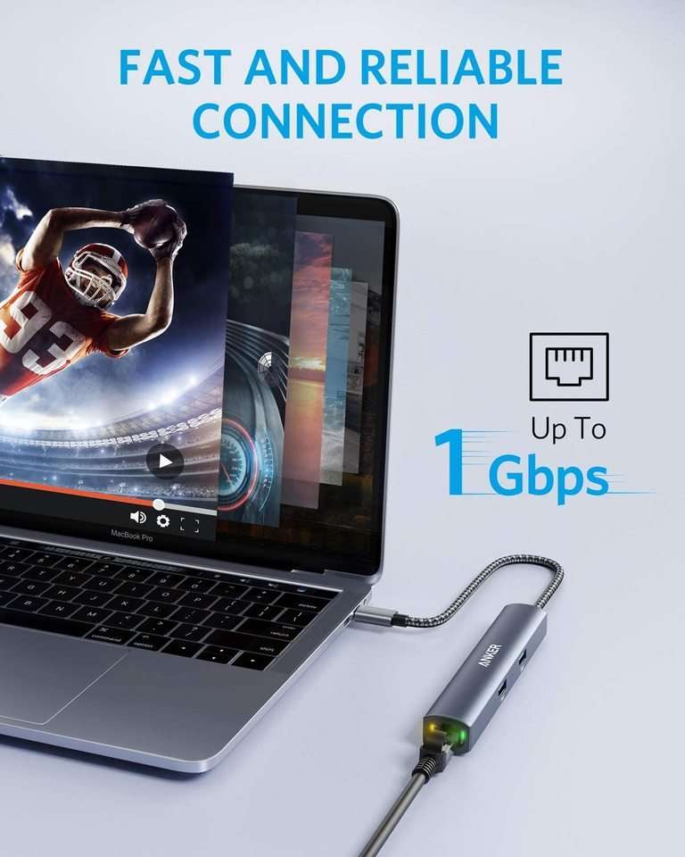 Grey USB-C hub with braided cable connected to a laptop