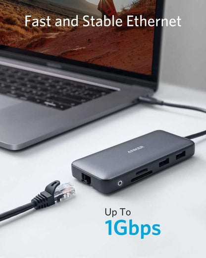 USB-C hub with Ethernet port and cable connected to a laptop