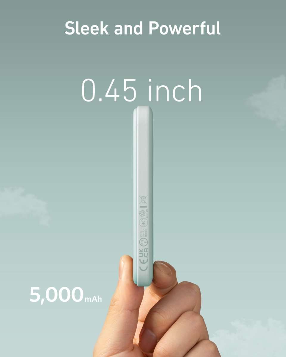 Anker 621 magnetic battery, slim light gray power bank held in hand, side view