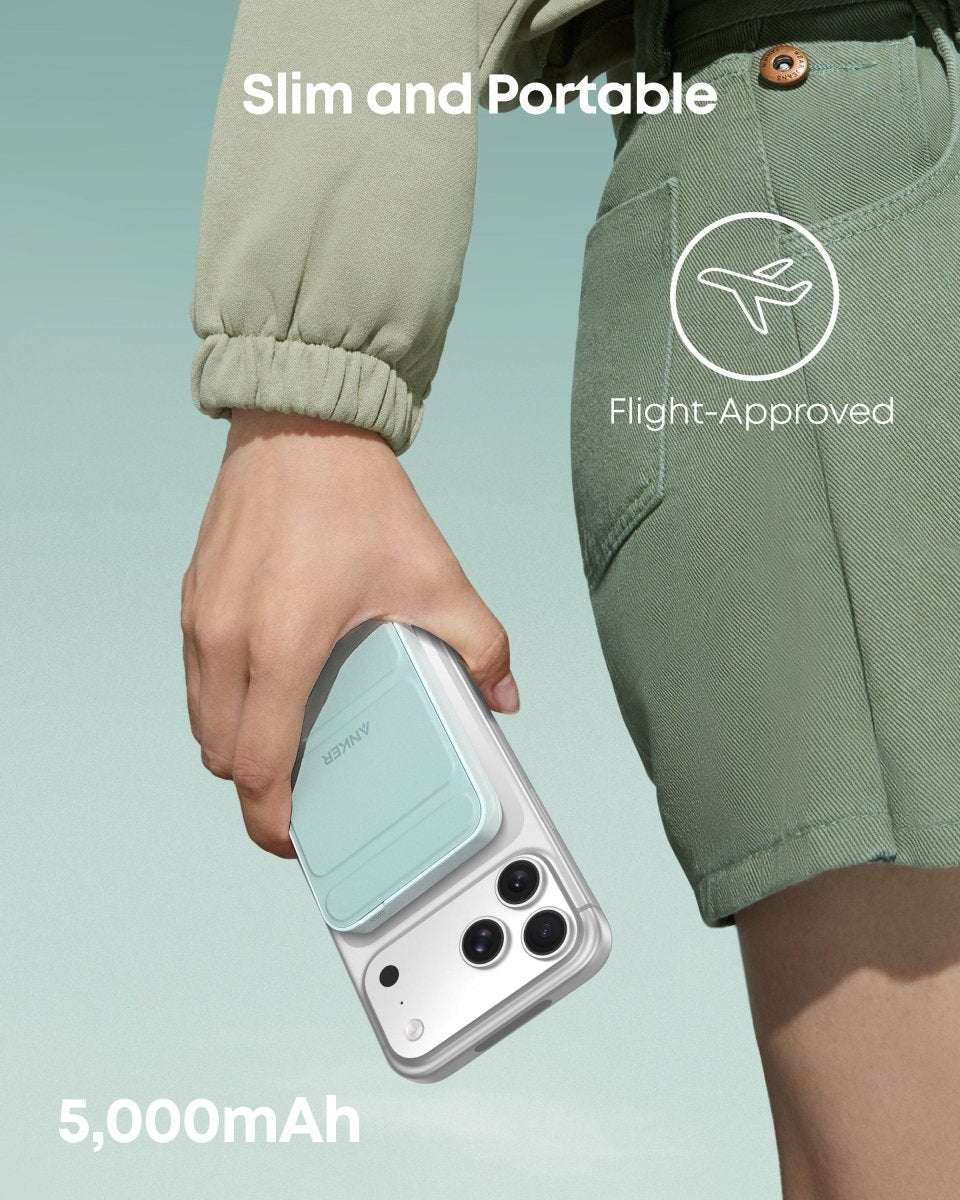 Slim light blue magnetic battery power bank in hand, with charging panel and ports