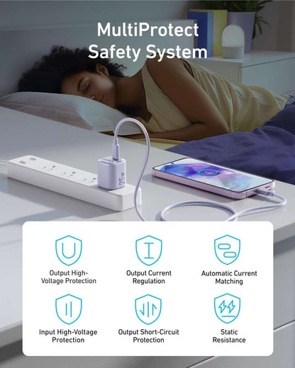 Anker 25W USB-C charger with foldable plug connected to a phone with charging cable.