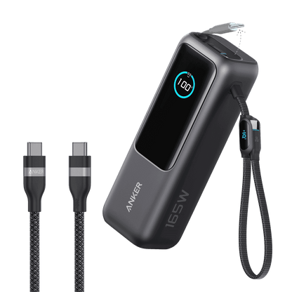 Dark laptop power bank with attached retractable cable set and USB-C connector