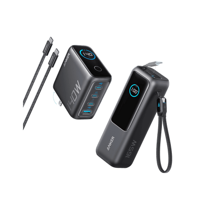 Pair of laptop power banks in dark gray with visible ports and cables