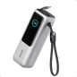 Anker laptop power bank in silver with retractable cable and charging port area