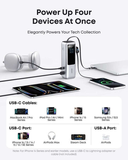 Silver laptop power bank with built-in cables powering four devices