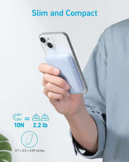 Magnetic power bank held in hand, compact white design with side USB-C port