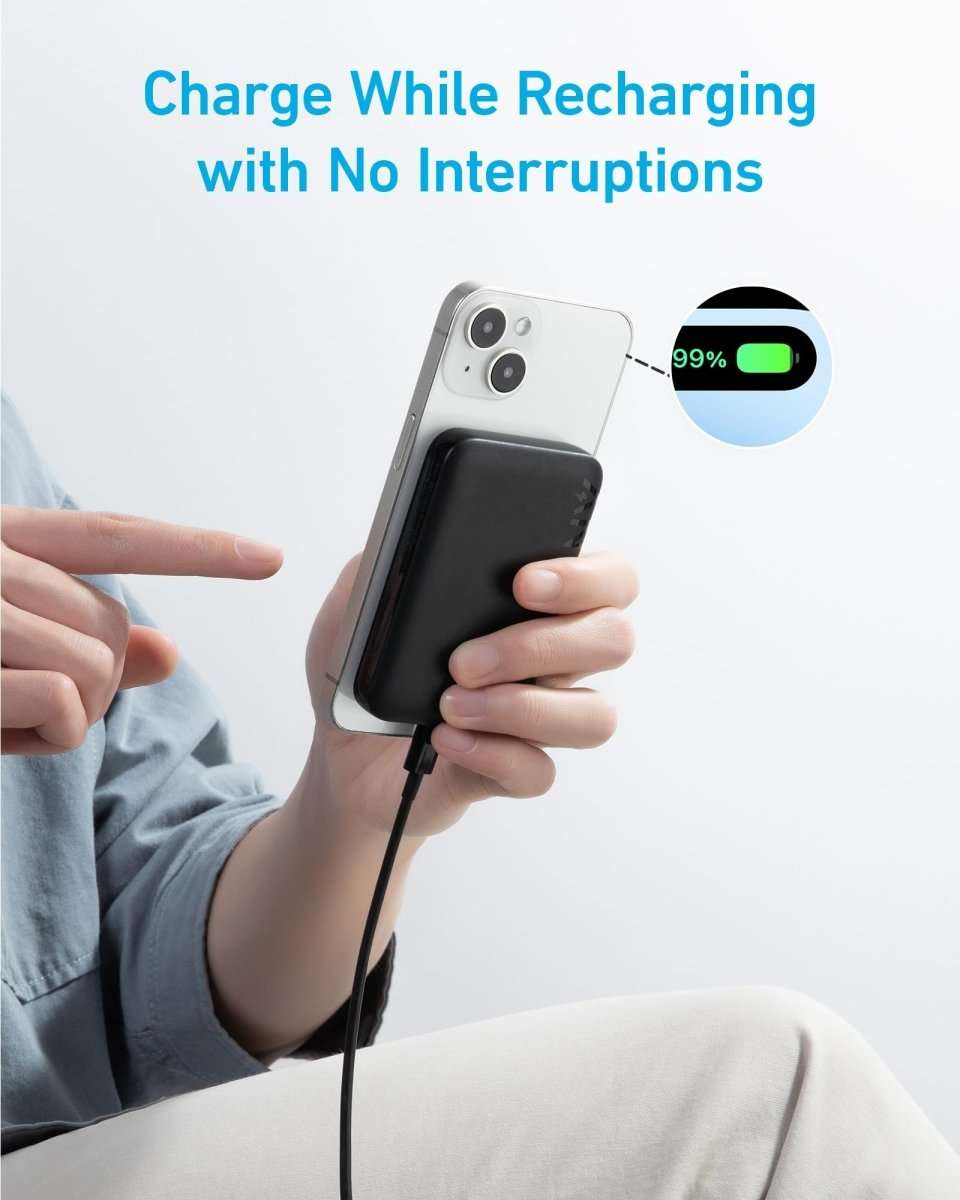 Magnetic power bank charging a phone with cable, black module shown in hand