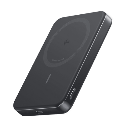 Slim wireless power bank, dark gray/black body with circular charging pad and side ports