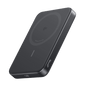 Slim wireless power bank, dark gray/black body with circular charging pad and side ports
