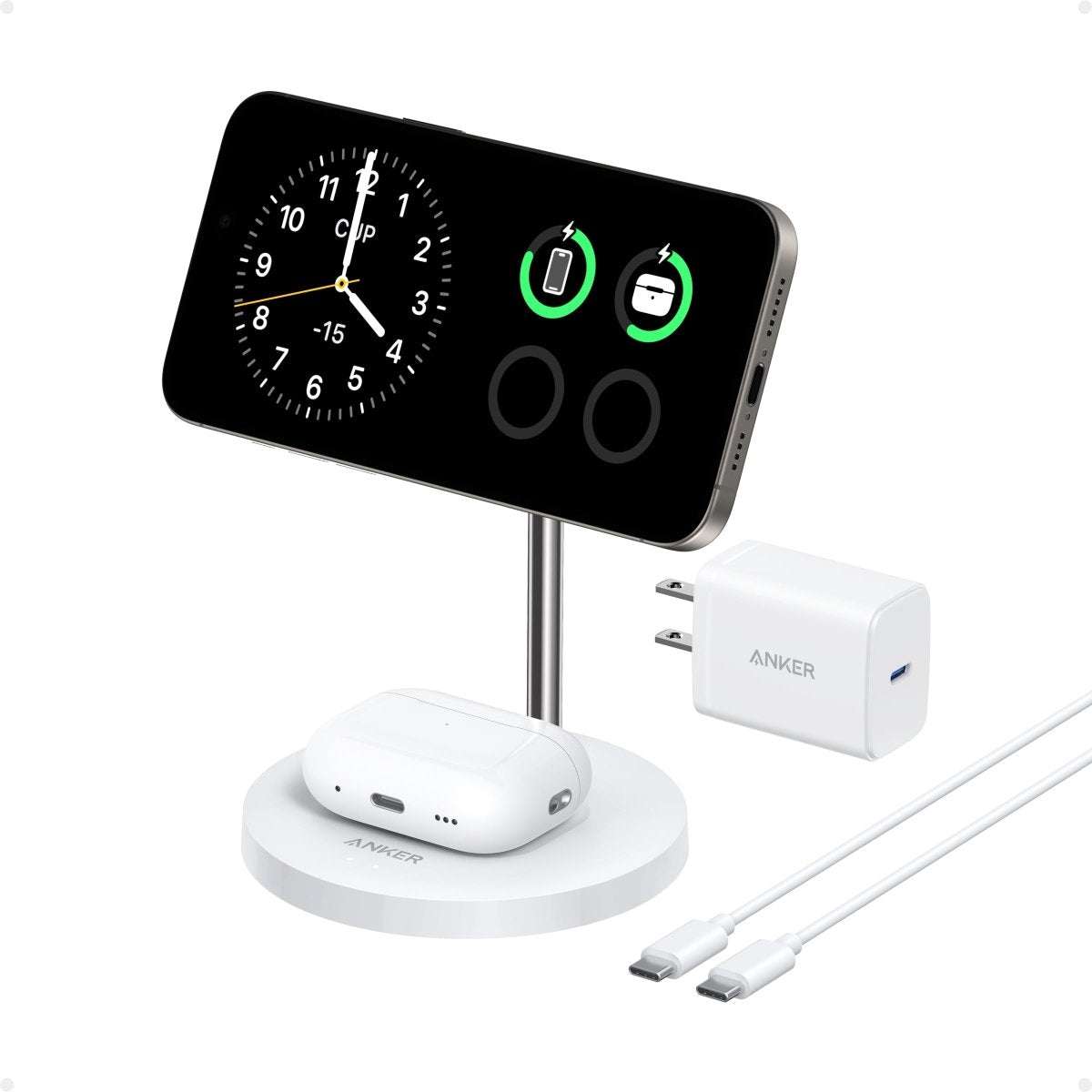 Wireless charger stand with black charging pad, white base, and phone/earbud holders