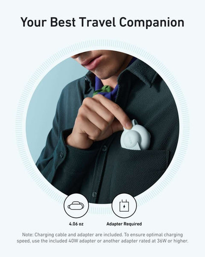 Portable wireless charging puck attached to a foldable pad for travel
