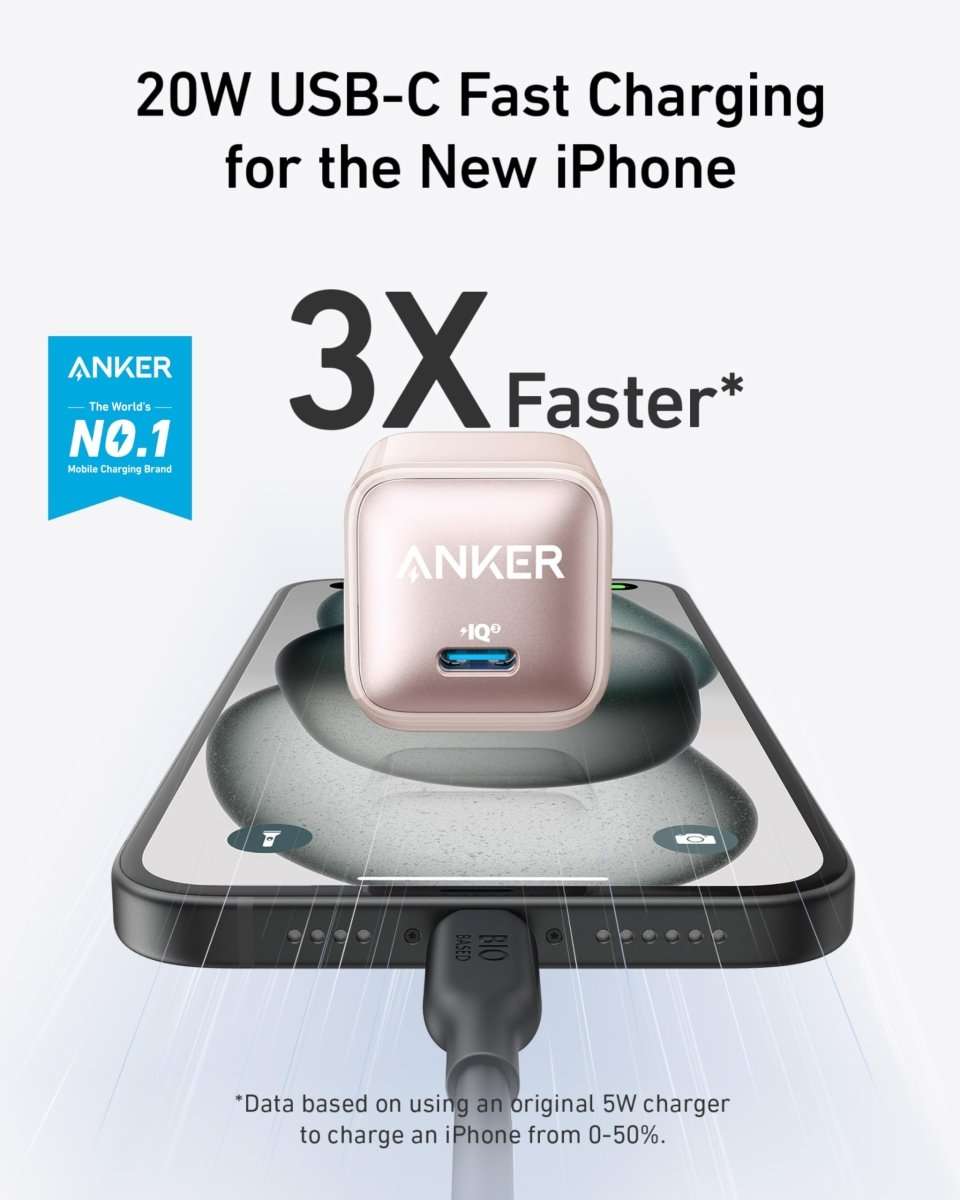 Rose-pink Anker 20W USB-C charger on charging dock, showing blue USB-C port