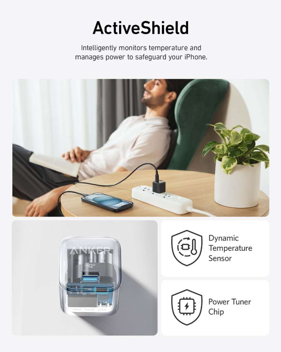 Anker Nano Charger (20W) white USB-C wall adapter placed on a desk near a phone