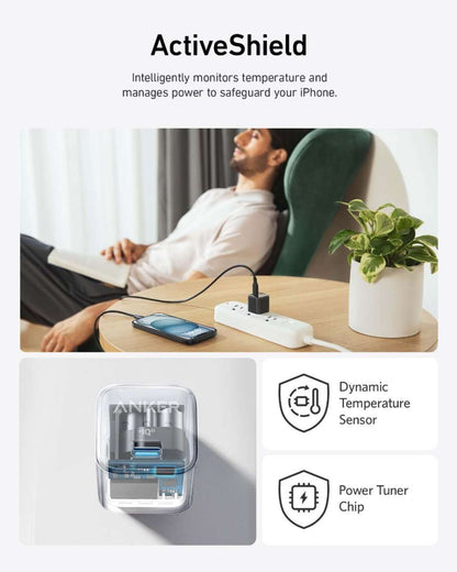 Anker Nano Charger (20W) white USB-C wall adapter placed on a desk near a phone