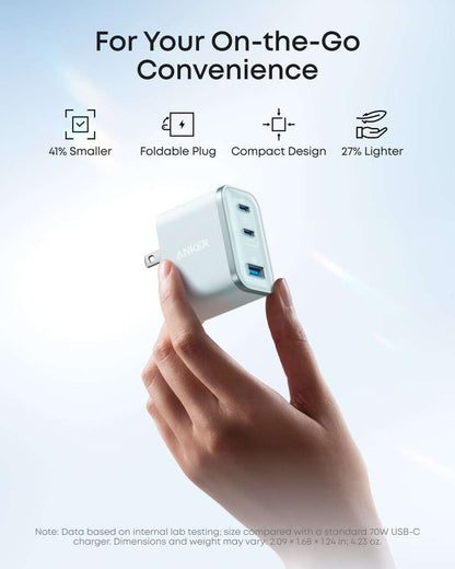 Anker Nano 70W charger held in hand, compact light blue body with three USB ports