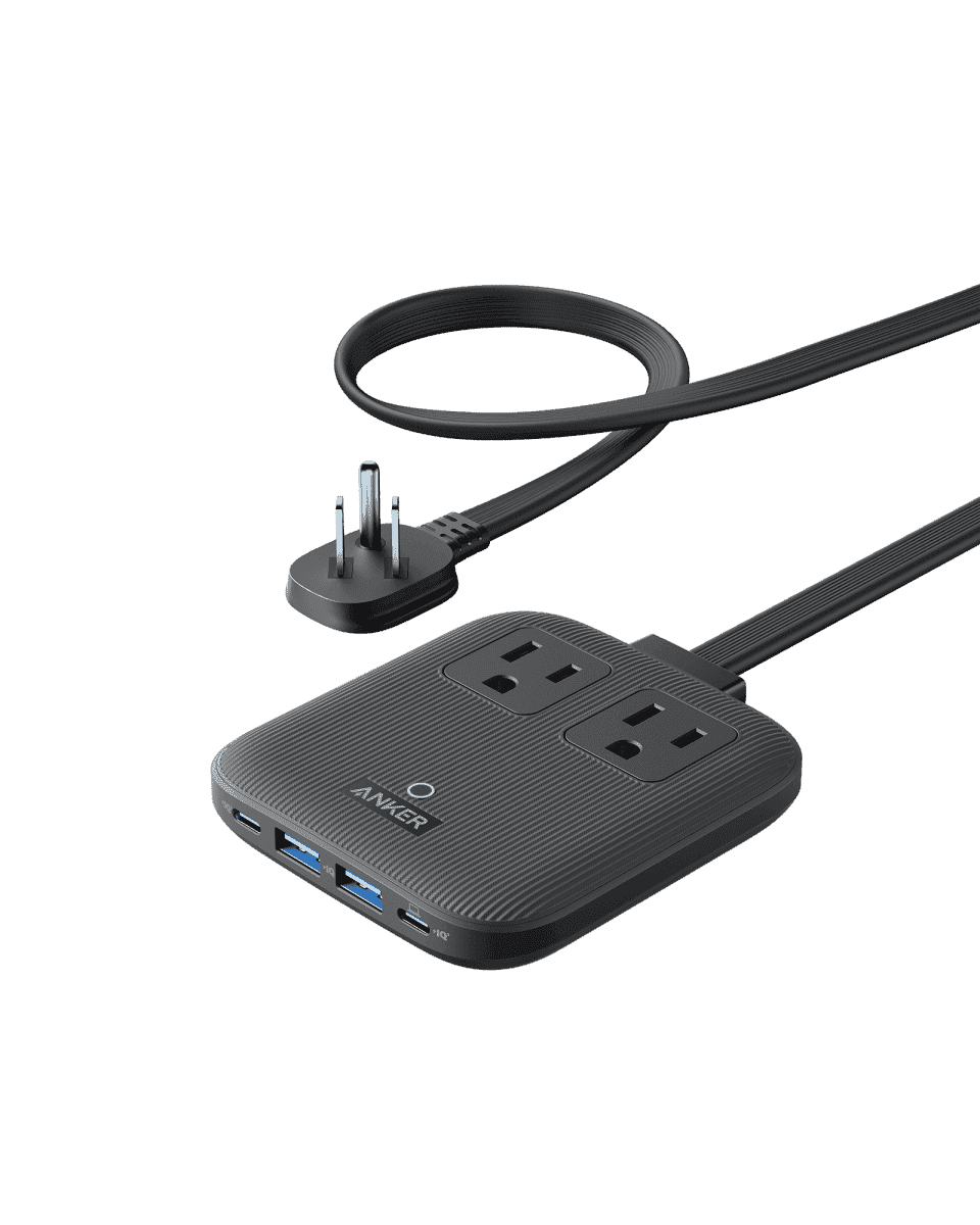 Black compact charging station with two AC outlets and USB ports, connected by cables